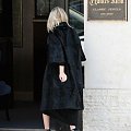 Ashley out and about in a black fur coat